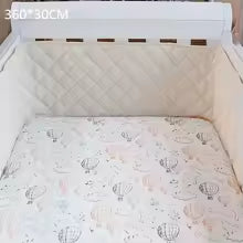 Tour de lit bébé plaid