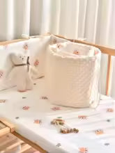 tour-de-lit-bébé-enroulé 